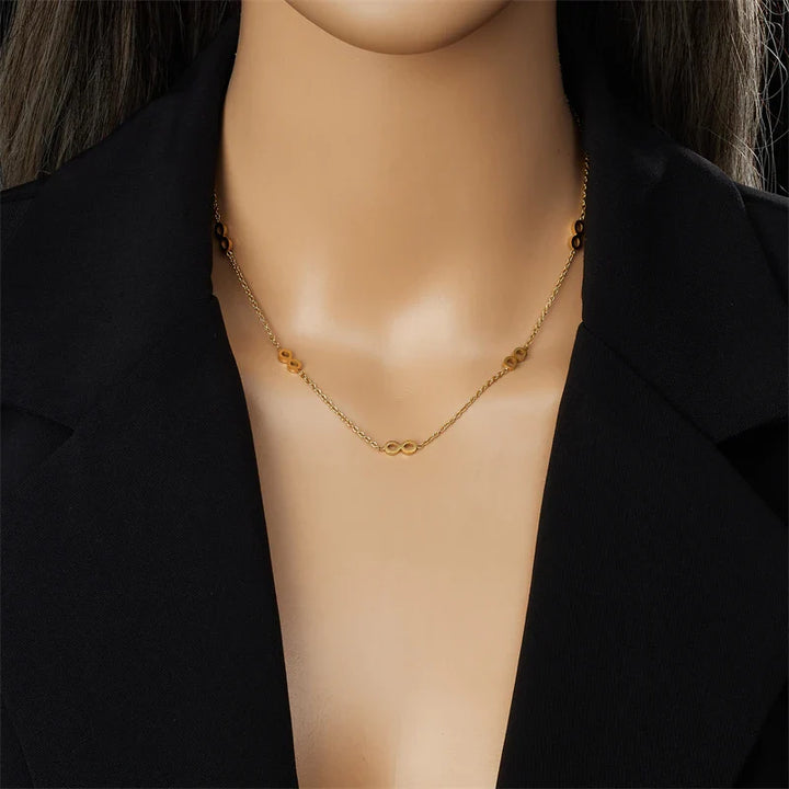 Parure bijoux nœud doré – Élégante et raffinée